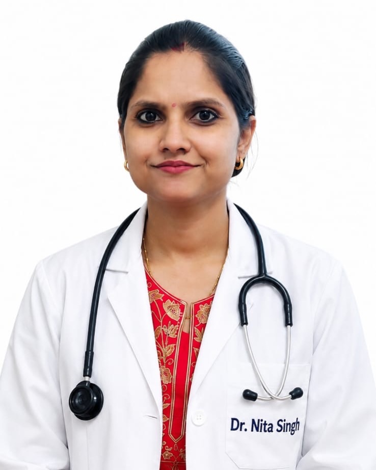 Dr. Nita Singh in a white doctor's coat with a stethoscope